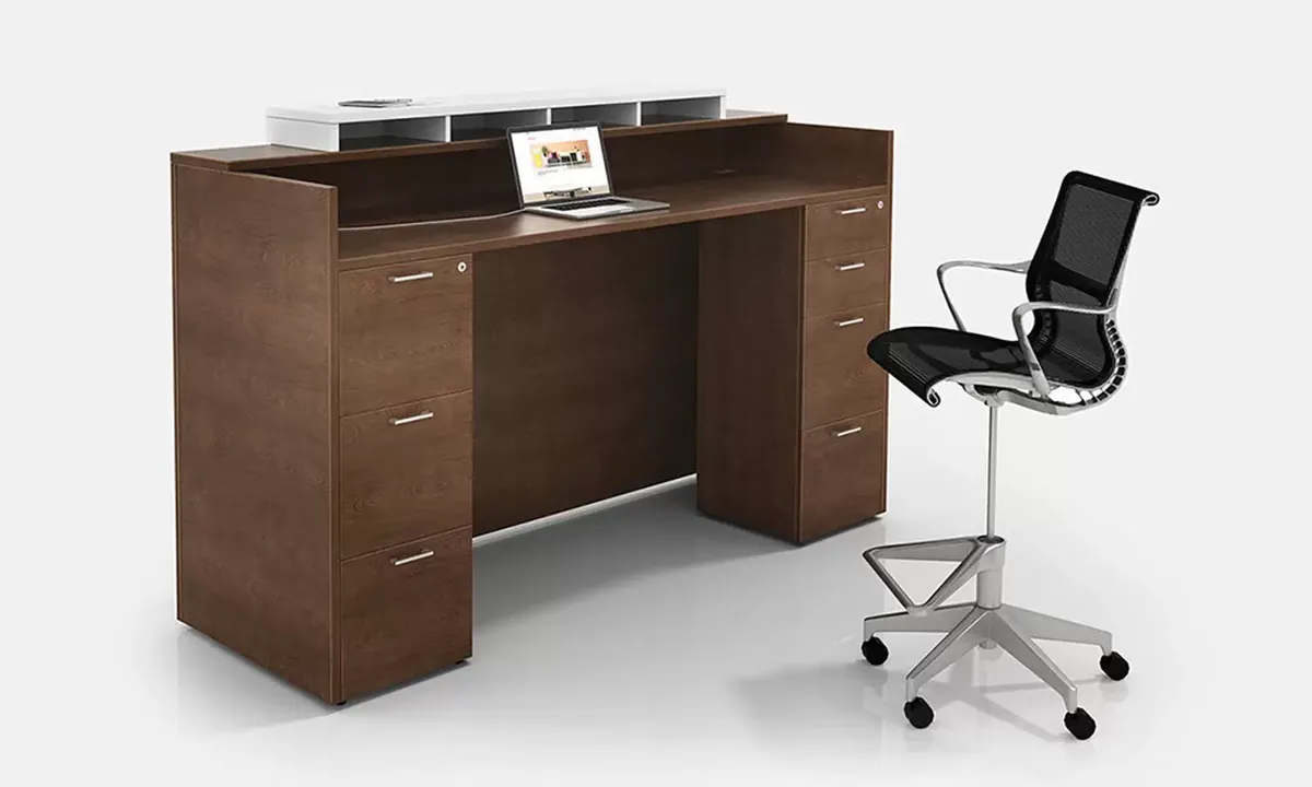 Dark wood reception desk and task chair